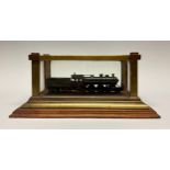 A model locomotive, GC & CN, mounted for display, oak and brass case, 31.5cm wide