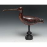 A painted softwood avian decoy, carved as a curlew, turned display stand, 34cm high