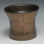 A 17th/18th century bronze bell shaped mortar, 10cm high, c.1700