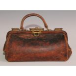 A late 19th/early 20th century leather Gladstone bag, brass fittings, lined interior, 30cm wide