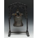 A Chinese bronze bell or gong, cast in the typical Archaic taste with dragons, lappets and taotie,