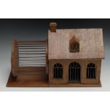 A French softwood architectural rodent cage, as a house with wheel beside, sliding tray to base,