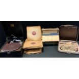 A HMV portable wind up No 5B gramophone, black case; shellac records; Scheidegger Princess-matic