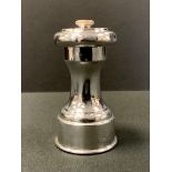 A silver pepper grinder, 9cm high, Birmingham, marks rubbed