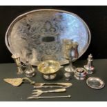 An EPNS oval two handled gallery tray, die stamped, pierced sides, 46cm wide; salt and pepper pot,