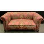 A Victorian two-seat chesterfield sofa, scroll arms, upholstered in a William Morris pattern