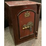 A Thomas Skidmore & Son of Wolverhampton Fire & Thief proof vintage safe, brown and red detailed