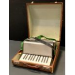 A Bell accordion, cased