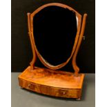 A Regency style shield shaped toilet mirror, shaped plate, twin base drawers, 60cm high, 45.5cm wide