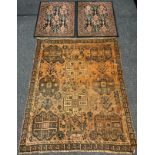 An early to mid 20th century Afghan style rug, hand-knotted with stylised motifs in earthy tones,