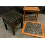 A modern black lacquer side table, single drawer to frieze, 55cm tall x 45cm x 45cm; a carved