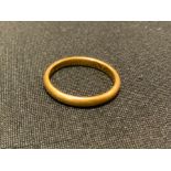 A 22ct gold wedding band, size K, 2.9g