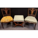 A pair of Edwardian inlaid mahogany salon chairs; a Victorian mahogany x-frame stool, c.1880, (3).