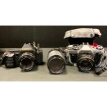 Cameras - Canon T70 35mm SLR camera body, another AE-1, each with 50mm lens, 70-300 zoon lens