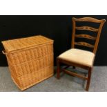 A large wickerwork lidded laundry basket; a Victorian mahogany hall chair, (2).