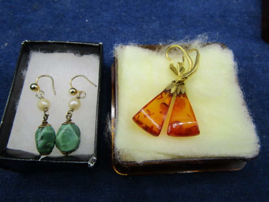 A pair of 'Amber' drop earrings and a pair of Jade drop earrings