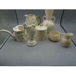 Belleek shamrock and basket weave vase, jug, harp and lidded pot. A mini jug and sugar bowl with