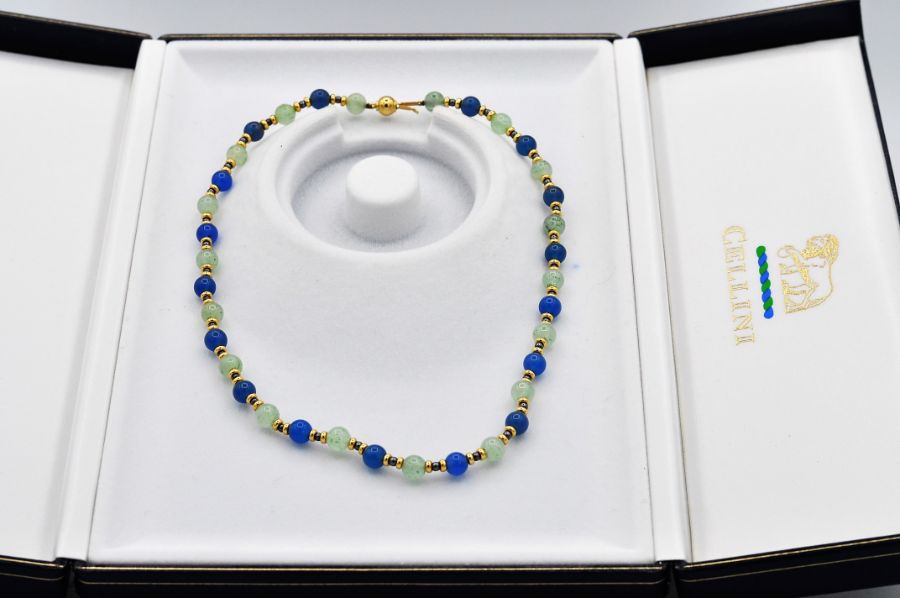 Lapis and opal beads, interspersed with eighteen carat gold rondelles and finished with an