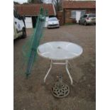 Glass topped garden table with parasol base and rotary washing line