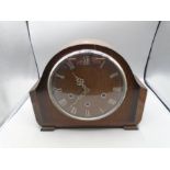 Oak cased mantel clock with key