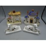 A pair of vintage china dogs and 2 tea light cottages