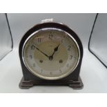 A quality bakelite mantle clock by Enfields of London, striking with key