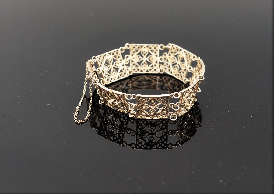 A ladies silver fret worked bracelet.