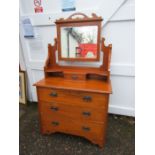 Pine dressing table with mirror over small central drawer with 3 drawers below. H78cm + 84cm