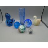 Blue glass squirrel, vase and paperweights plus a marble swan