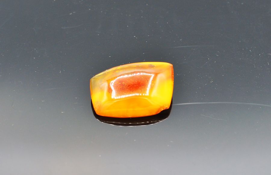 A butterscotch amber type brooch approx 45cm wide