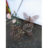 2 metal bicycle planters and metal butterfly wall art