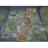 About 27 bank notes from around the world