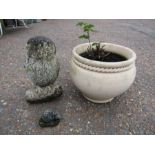 Ceramic plant pot with concrete owl and hedgehog garden ornaments