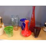 Handblown glass vase and a collection of colourful glass vases