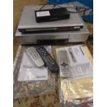 Panasonic and Philips dvd/ vhs recorders, a top box and a box of scart leads and accessories