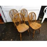 Set of 4 pine wheelback dining chairs