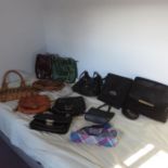 Selection of 12 assorted handbags DKNY River Island Some with tags various materials including