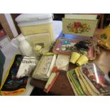 Abox of sundry items to include ice box, retro magazine rack, tray, Wisbech tea towel etc etc