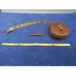 A vintage bone folding ruler, leather tape measure and a small pen knife