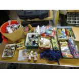 A large lot of sewing accessories to include baskets, materials, trims, beads, china women pin