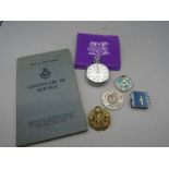 R.A.F service book, pocket watch badges, material patches and ribbons