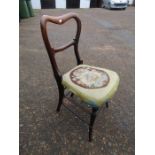 Mahogany chair with embroidered seat