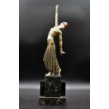 AFTER DEMETRE CHIPARUS (1886-1947) FOOTSTEPS, patinated bronze and ivory sculpture, on onyx and
