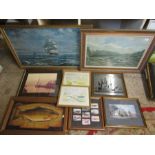 A collection of framed pictures in various media
