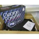 George Foreman grill new in box and a Palson rodeo griidle plate, also new in box