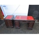 Pedestal desk with one central drawer flanked by four drawers each side and matching two drawer