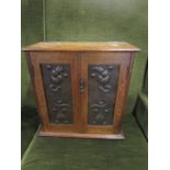 Oak smokers/pipe cabinet with ornate doors and 5 drawers within H40cm W40cm D19cm approx