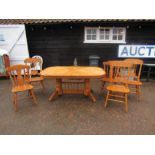 Extending 6-8 seater hard wood table with 5 chairs