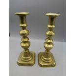 A pair of Georgian candle sticks