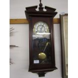 Timemaster wall clock with pendulum and key